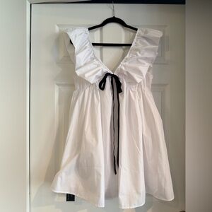 White Ruffled V-Neck Sundress with Black Tie